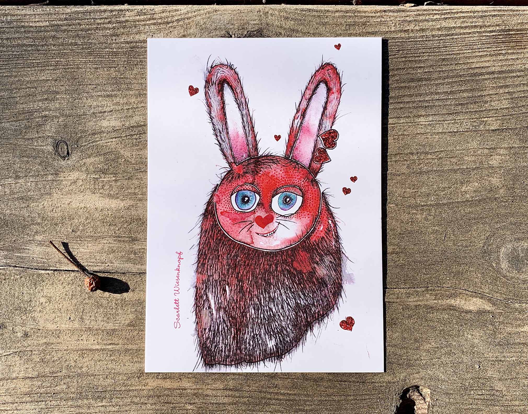 Postkarte Scarlett Wiesenknopf - das Häschen und Herzchen in Rot. Illustration der Künstlerin Maren Maiwald
